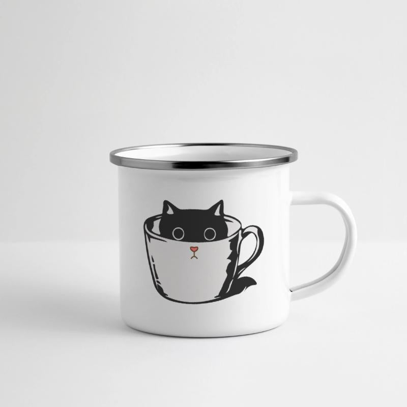 Black kitten with red nose hiding in a cup